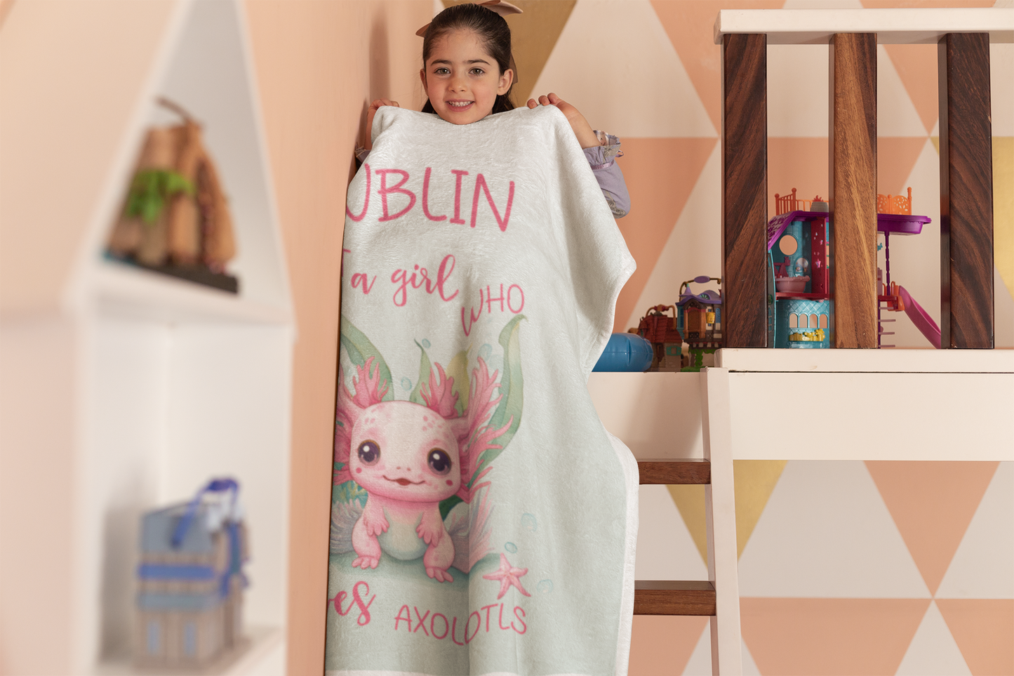 Personalized Just a Girl Who Loves Axolotls 50x60 Throw Blanket with little girl holding it up.