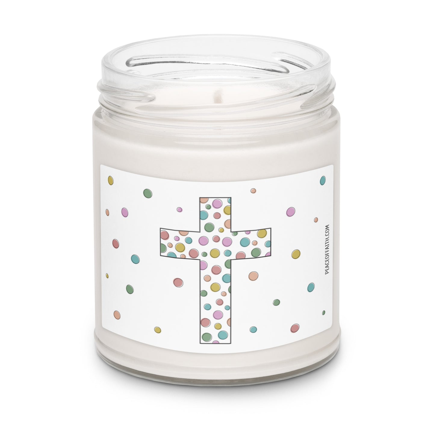 Clean cotton scented white soy candle with a label that has a multi colored polka dotted Christian cross with polka dots around.