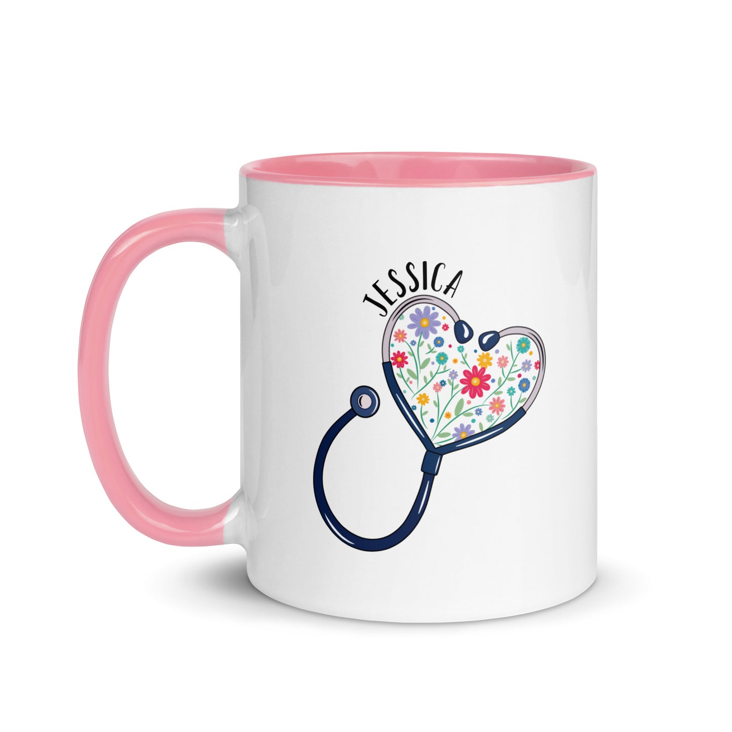 11 oz white ceramic mug with pink handle with with a stethoscope in the shape of a heart with multi-colored flowers inside and personalized with a name hugging the top of the heart shape.
