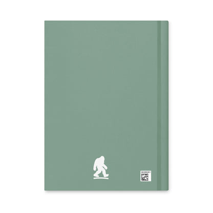 Personalized Adventure Travel Hardcover Journal with mountain scene with loch ness, alien spaceship & bigfoot with your name on the bottom. 