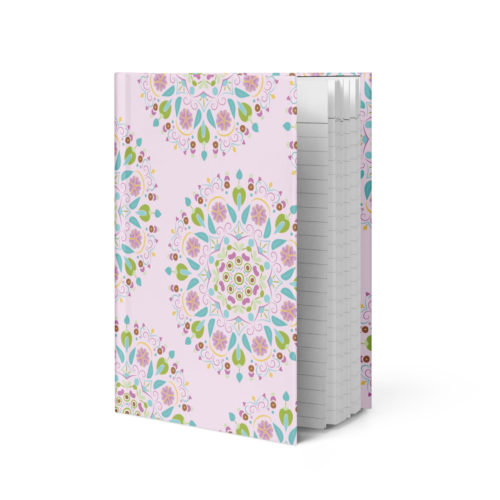 Light pink hardcover lined journal with Scandanavian inspired mandalas all over the cover.