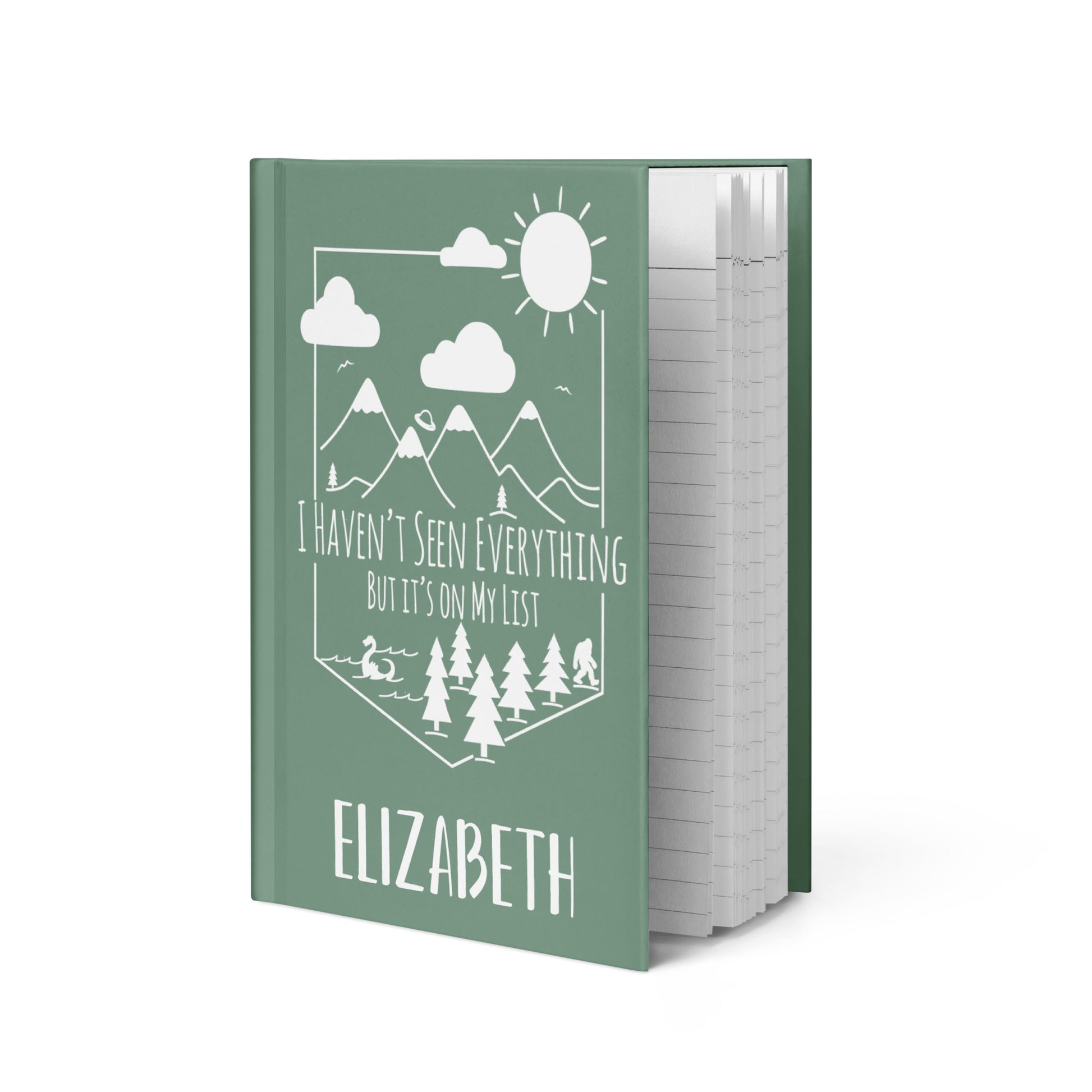 Personalized Adventure Travel Hardcover Journal with mountain scene with loch ness, alien spaceship & bigfoot with your name on the bottom. 