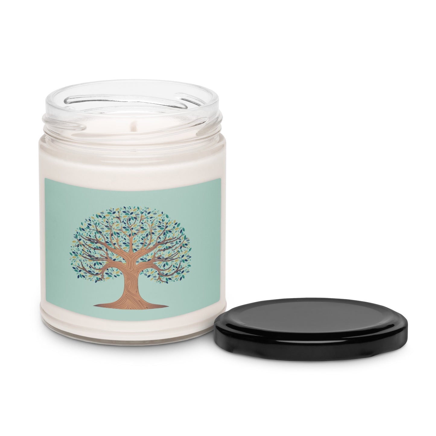 White candle in a clear jar with the Tree of Life with multi colored leaves on a light green background.
