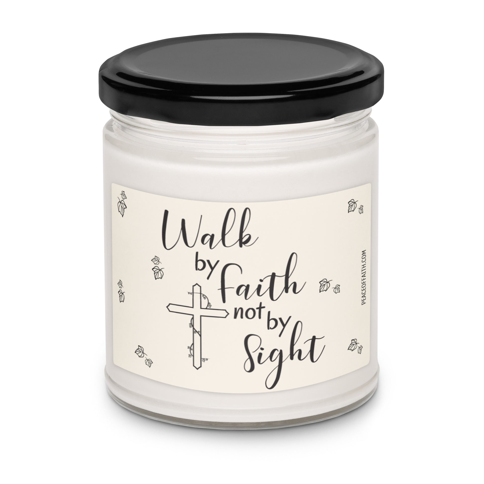Clean cotton scented white soy candle with a label that says 'Walk by Faith not by Sight' with a Christian cross and ivy leaves.