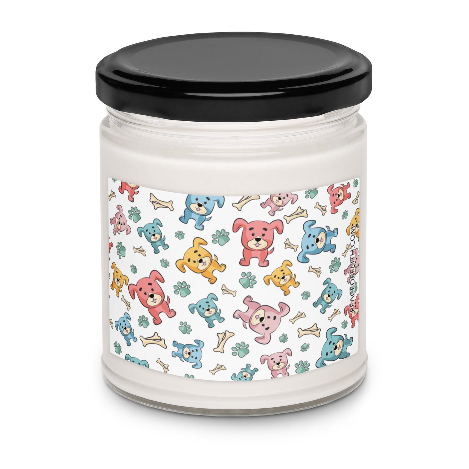 Clean cotton scented soy candle in a clear glass jar with multi-colored puppies with bones and paws tossed around on the front label.
