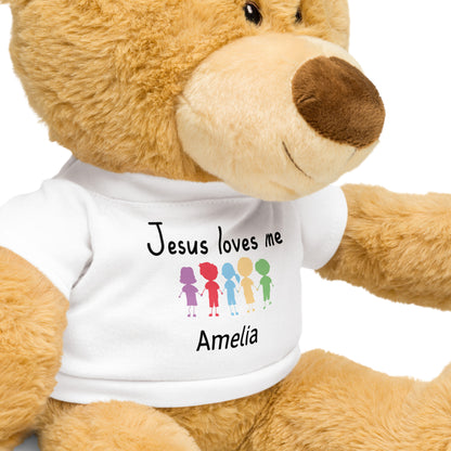 Personalized brown Teddy Bear wearing a white T-shirt that says  Jesus Loves Me with child's name and colorful cartoon little kids holding hands. 