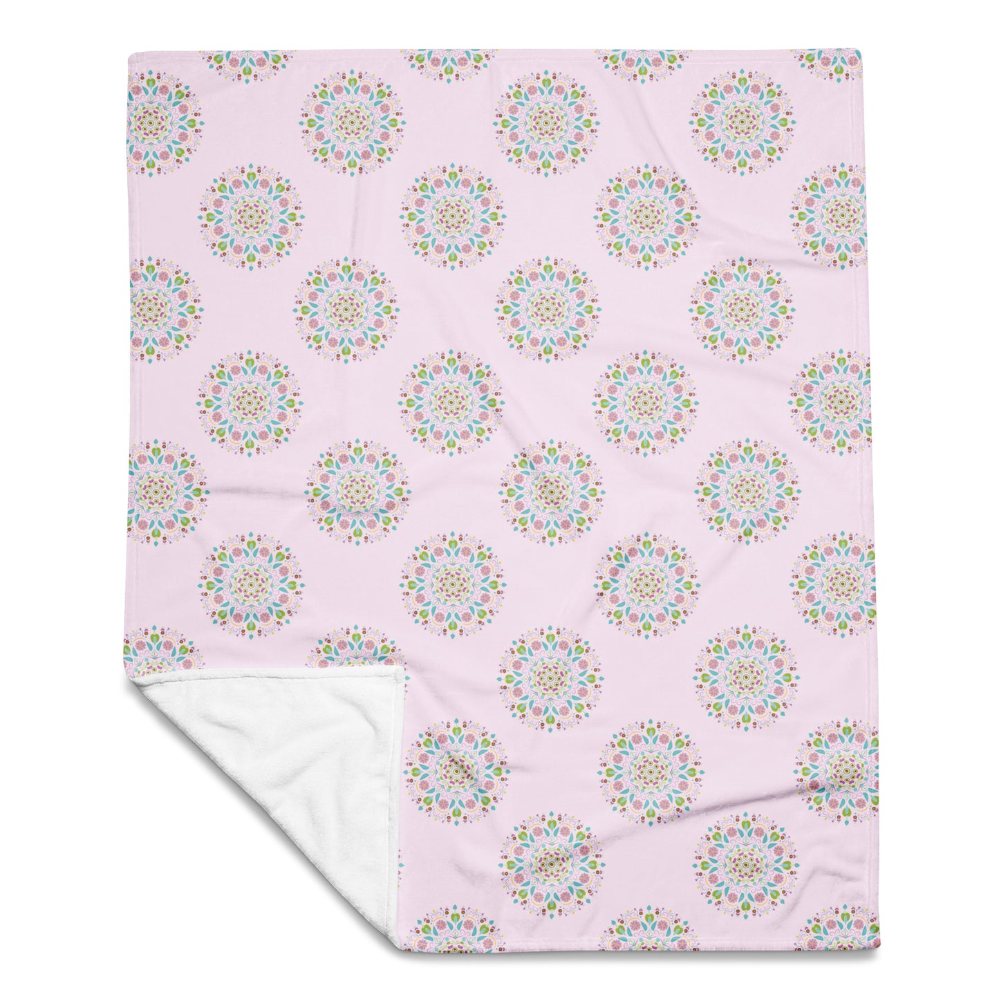 50x60 pink throw blanket with Scandinavian styled mandalas patterned on the front.