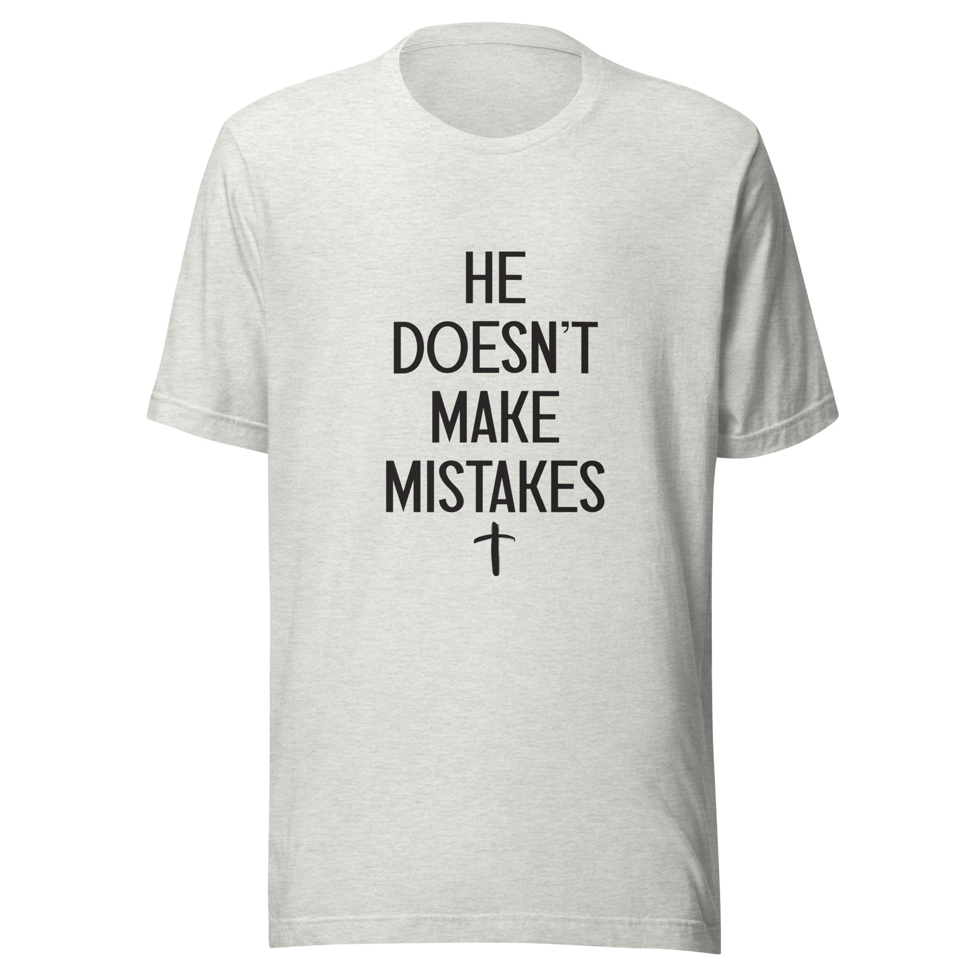 Gray Unisex short sleeve tee says He Doesn't Make Mistakes with a small cross at the bottom. 