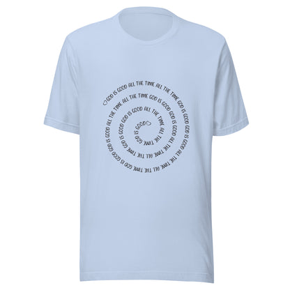 Baby blue short sleeve t-shirt that has a spiral of the words 'God is good all the time all the time God is good', with two small hearts one at the start of the spiral and one at the end in the middle.