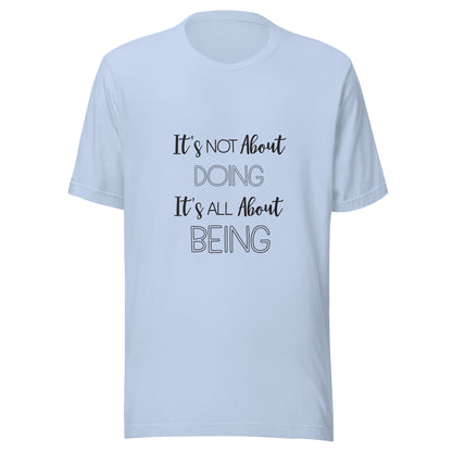 Baby blue unisex short sleeve t-shirt that states It's not about doing it's all about being.