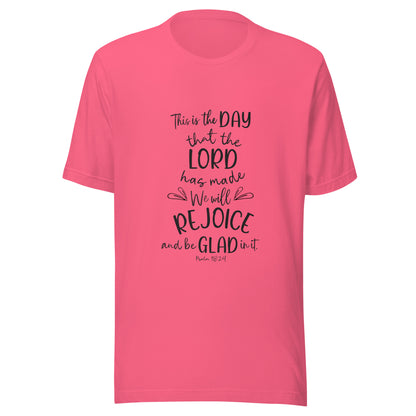 Bright pink unisex short sleeve t-shirt with Psalm 118:24 scripture with a vine up one side of the words.