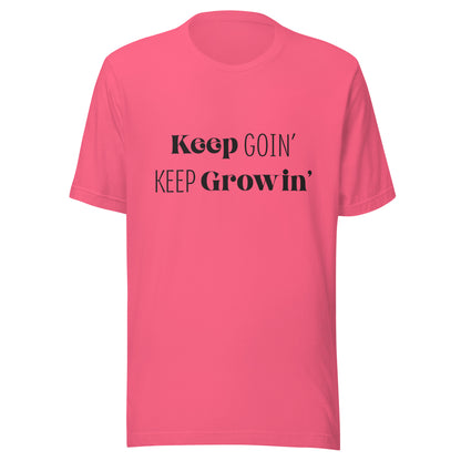 Bright pink unisex short sleeve  t-shirt that says 'Keep Goin' Keep Growin'.