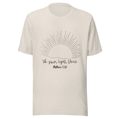 Heather dust unisex short sleeve t-shirt that has a sun with many rays and underneath says 'Let your light shine', Matthew 5:16.