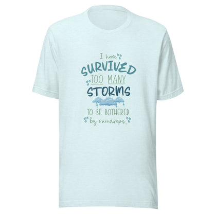 Heather ice blue unisex short sleeve t-shirt that states 'I have survived too many storms to be bothered by raindrops' with raindrops and storm clouds.