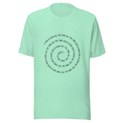 Heather mint short sleeve t-shirt that has a spiral of the words 'God is good all the time all the time God is good', with two small hearts one at the start of the spiral and one at the end in the middle.