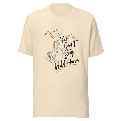 Heather natrural unisex short sleeve t-shirt that states 'You can't stop a wild horse' with a horse rearing up and mountains in the background.