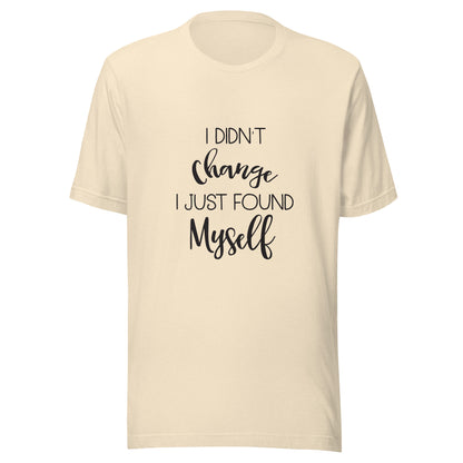 Heather natural unisex short sleeve t-shirt that says 'I didn't change I just found myself'.