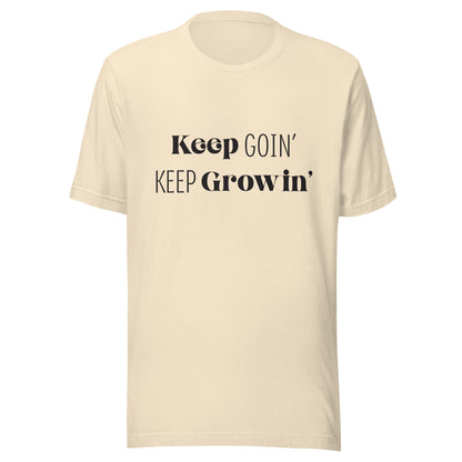 Heather natural unisex t-shirt that says 'Keep Goin' Keep Growin'.