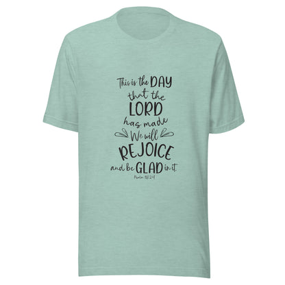 Heather dusty blue unisex short sleeve t-shirt with Psalm 118:24 scripture with a vine up one side of the words.