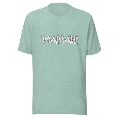 Heather prism dusty blue short sleeve unisex t-shirt that says Mamaw on the front written in cute font with flowers inside each letter. 