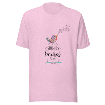 Heather prism lilac short sleeve unisex tee with a multi-colored bird with musical notes on a black inked birdhouse that says Sing His Praises.