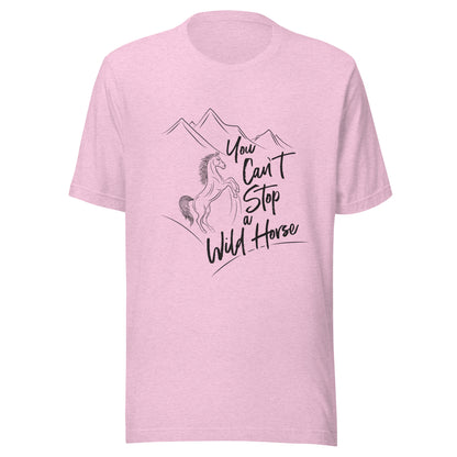 Heather prism lilac unisex short sleeve t-shirt that states 'You can't stop a wild horse' with a horse rearing up and mountains in the background.