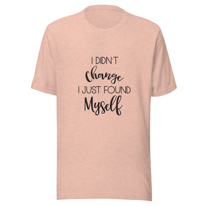 Heather prism peach unisex short sleeve t-shirt that says 'I didn't change I just found myself'.