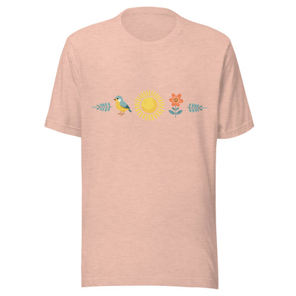 Heather prism peach unisex t-shirt with a sun in the middle with a bird on one side and a flower on the other.