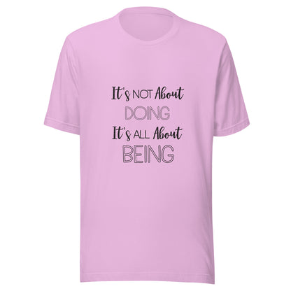 Lilac unisex short sleeve t-shirt that states It's not about doing it's all about being.