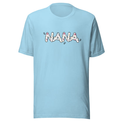Ocean blue short sleeve unisex t-shirt that says Nana on the front written in cute font with flowers inside each letter. 