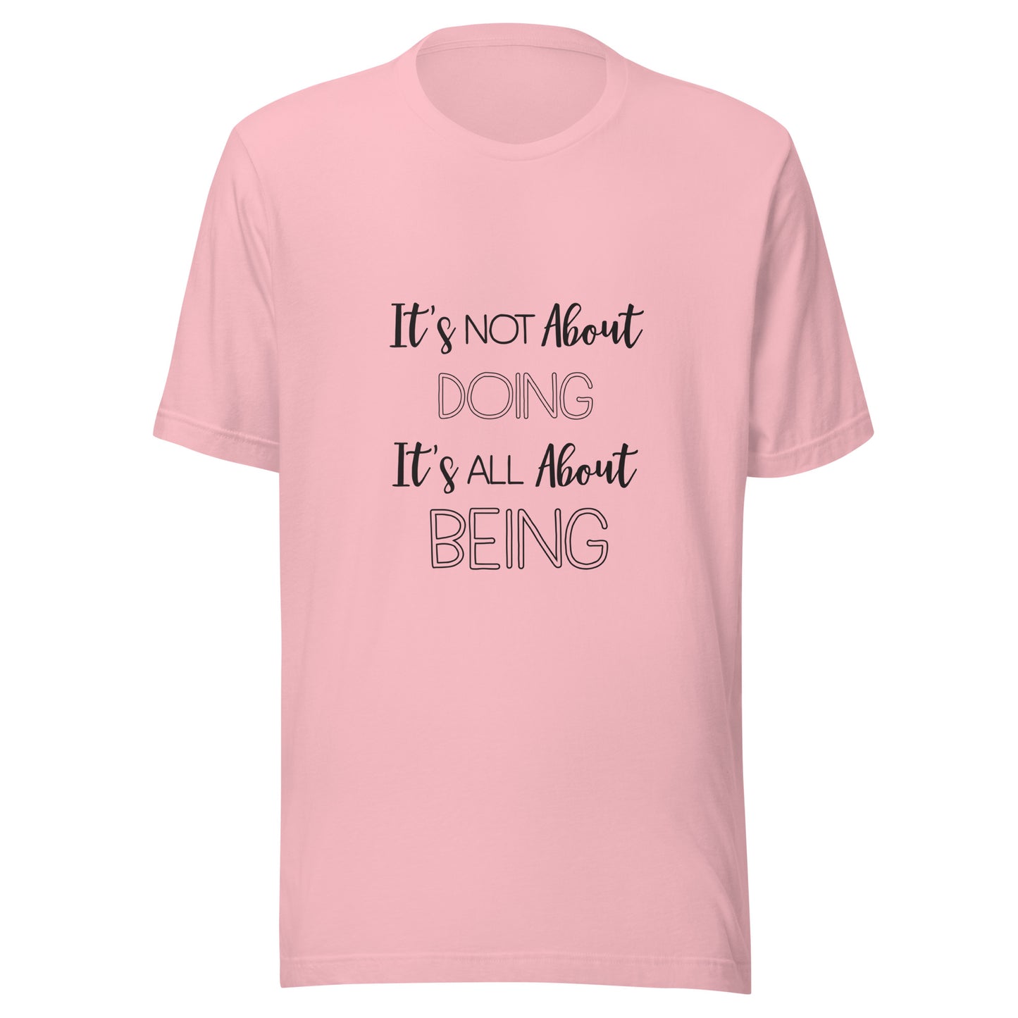 Pink unisex short sleeve t-shirt that states It's not about doing it's all about being.