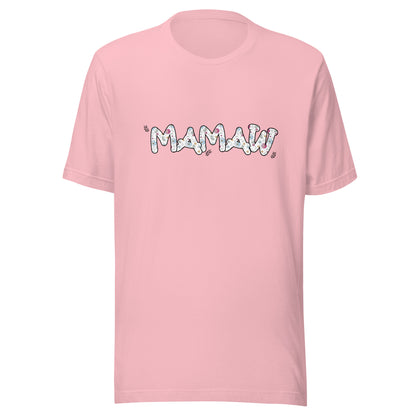 Pink short sleeve unisex t-shirt that says Mamaw on the front written in cute font with flowers inside each letter. 