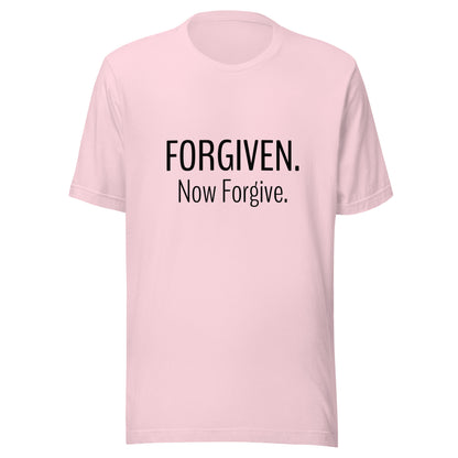 Soft pink unisex short sleeve t-shirt that states Forgiven Now Forgive.