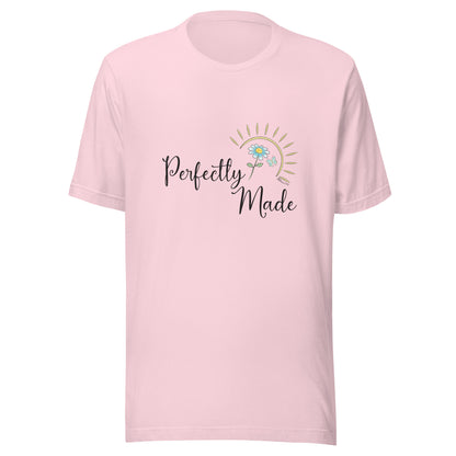 Soft pink unisex short sleeve t-shirt that says Perfectly Made with a flower butterfly and sun.