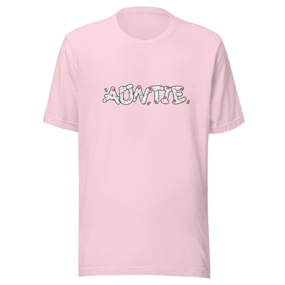 Soft pink short sleeve unisex t-shirt that says Auntie on the front written in cute font with flowers inside each letter. 
