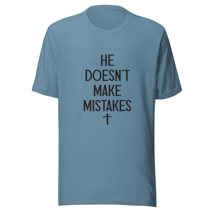 Steel blue Unisex short sleeve tee says He Doesn't Make Mistakes with a small cross at the bottom. 