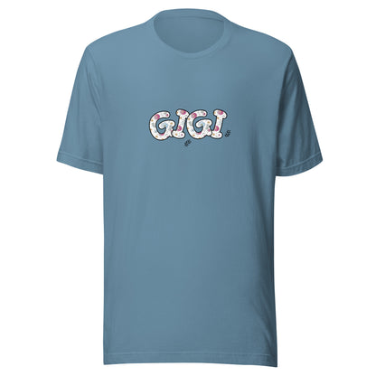 Steel blue short sleeve unisex t-shirt that says Gigi on the front written in cute font with flowers inside each letter. 