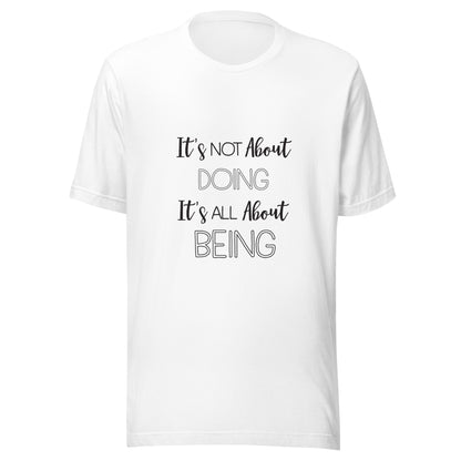 White unisex short sleeve t-shirt that states It's not about doing it's all about being.