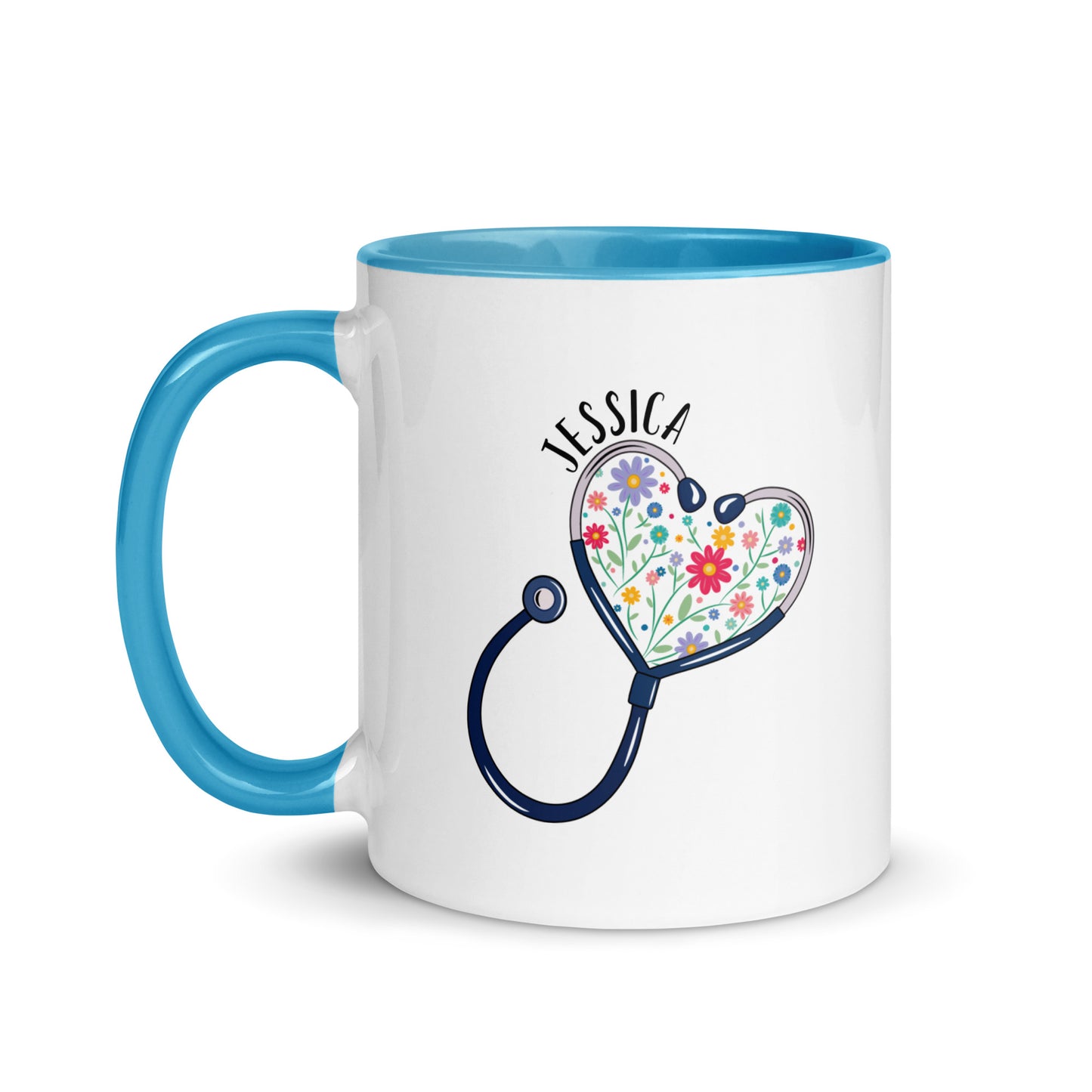 11 oz white ceramic mug with light blue handle with with a stethoscope in the shape of a heart with multi-colored flowers inside and personalized with a name hugging the top of the heart shape. 