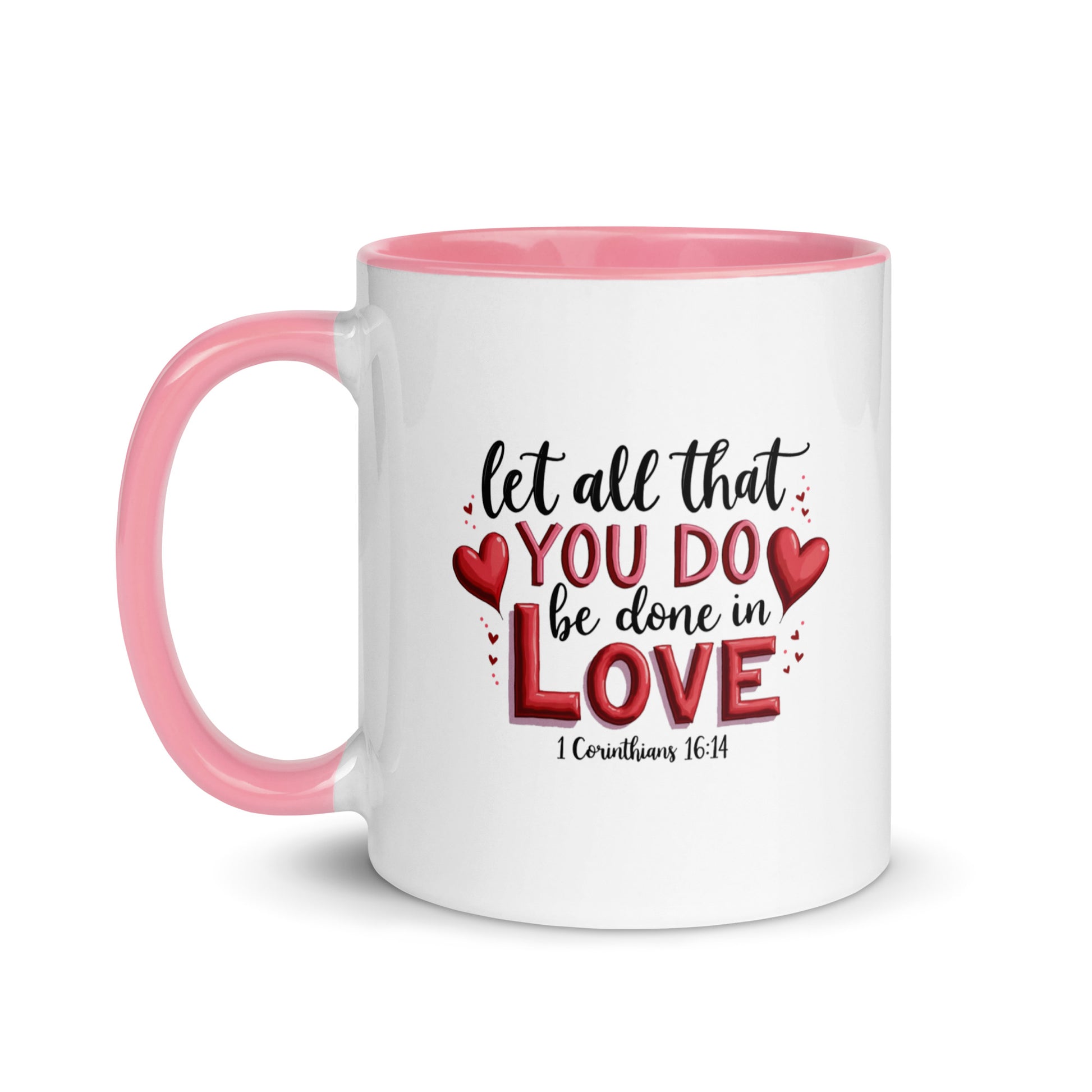 White mug with color handle and interior, featuring a motivational quote that reads Let all You Do be done in Love with hearts.