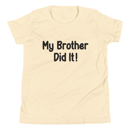 Cream short sleeve unisex youth sized t-shirt that says My Brother Did It. 