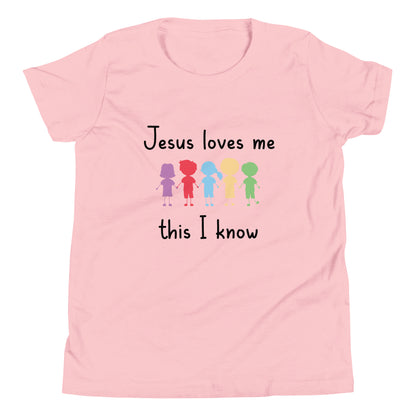 Pink short sleeve unisex youth sized t-shirt that says Jesus Loves Me This I Know with 5 children in different cute solid colors holding hands. 