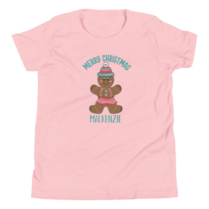 Personalized with childs name Merry Christmas Gingerbread Girl Youth Short Sleeve pink T-Shirt.